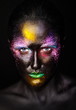 art photo of model with creative black mask face