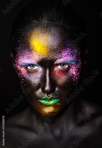 Photo: art photo of model with creative black mask face art photo of model with creative black mask face