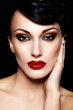 sexy model with bright makeup,with red lips and clean skin