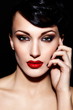 sexy model with bright makeup,with red lips and clean skin