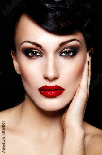 Photo: sexy model with bright makeup,with red lips and clean skin sexy model with bright makeup,with red lips and clean skin