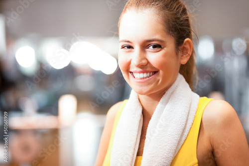 Photo: Woman smiling in a fitness club Woman smiling in a fitness club