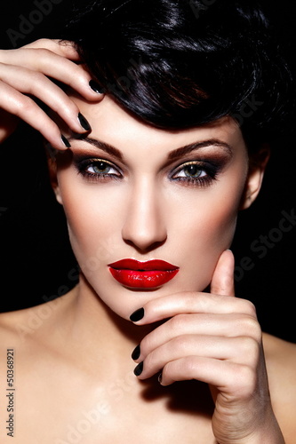 Photo: sexy model with bright makeup,with red lips and clean skin sexy model with bright makeup,with red lips and clean skin