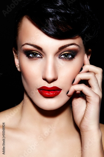 Photo: sexy model with bright makeup,with red lips and clean skin sexy model with bright makeup,with red lips and clean skin