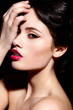 sexy model hwit bright makeup, with red lips, with perfect skin