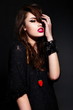 glamor sexy stylish model in black cloth with bright makeup