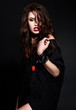 glamor stylish brunette model in black cloth with bright makeup