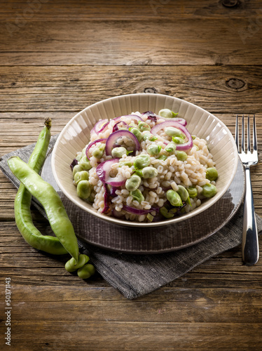 Photo: barley risotto with beans broad and onions, vegetarian food barley risotto with beans broad and onions, vegetarian food