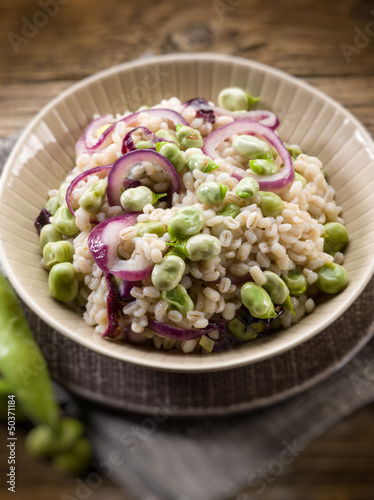 Photo: barley risotto with beans broad and onions,selective focus barley risotto with beans broad and onions,selective focus