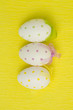 Three easter eggs with different colors