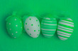 Four green easter eggs