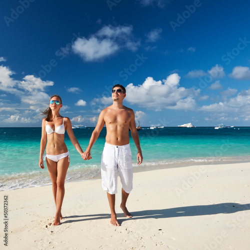 Photo: Couple on a beach at Maldives Couple on a beach at Maldives