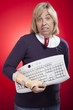 Photo: woman holding a keyboard with carpal tunnel injury woman holding a keyboard with carpal tunnel injury