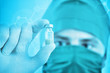 Doctor with drug in hand isolated