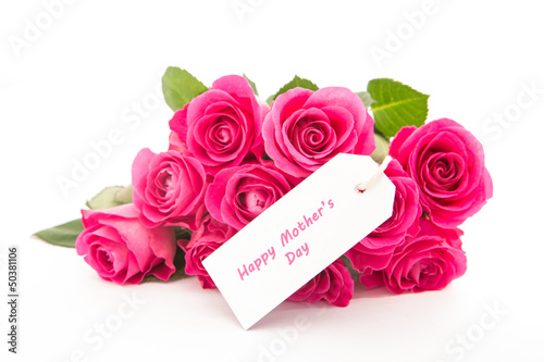 Photo: Close up of a beautiful bouquet of pink roses with a happy mothe Close up of a beautiful bouquet of pink roses with a happy mothe