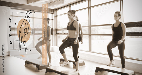 Photo: Women workout with orange interface showing them how to do Women workout with orange interface showing them how to do