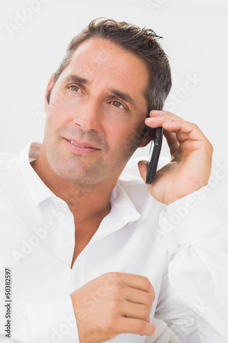 Photo: Portrait of man phoning Portrait of man phoning