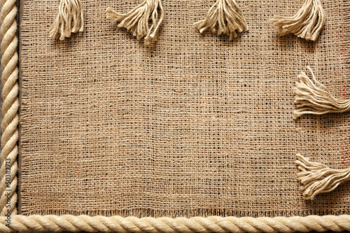 Photo: Rope and jute old vintage background concept on boards Rope and jute old vintage background concept on boards