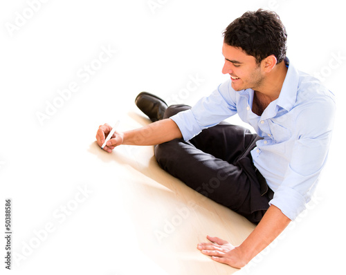 Photo: Business man writing on the floor Business man writing on the floor