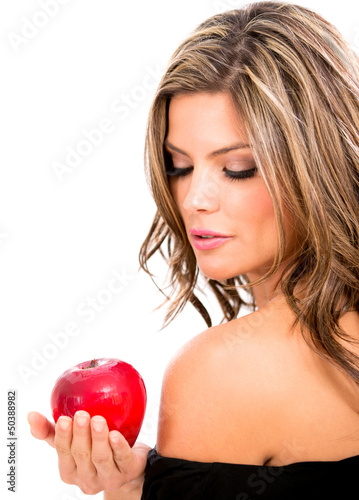 Photo: Beautiful woman with an apple Beautiful woman with an apple