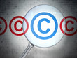 Law concept: Copyright with optical glass