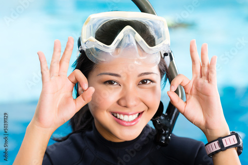 Photo: young indonesian diver says ok young indonesian diver says ok