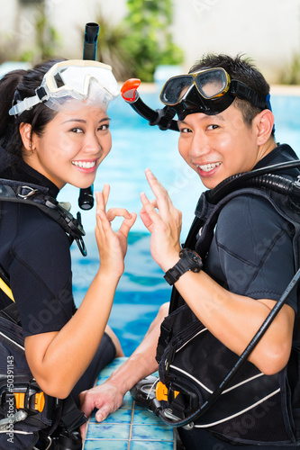 Photo: Teacher and student in a diving school Teacher and student in a diving school