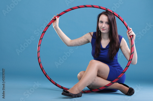 Photo: Dance hoop Beautiful woman in blue Dance hoop Beautiful woman in blue