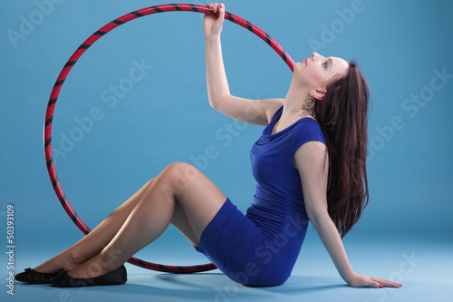 Photo: Dance hoop Beautiful woman in blue Dance hoop Beautiful woman in blue
