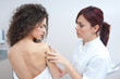 woman at dermatology examination