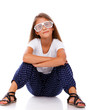 Photo: Stylish little girl in modern glasses Stylish little girl in modern glasses
