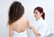 Photo: woman at dermatology examination woman at dermatology examination