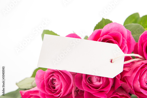 Photo: Close up of a beautiful bouquet of pink roses with a blank day c Close up of a beautiful bouquet of pink roses with a blank day c