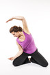 Woman stretch her back