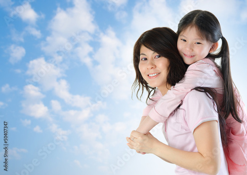 Photo: Asian family outdoor fun. Asian family outdoor fun.