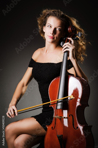 Photo: Woman performer with cello in studio Woman performer with cello in studio