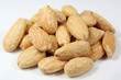 Almonds heap against white background