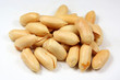 Peanuts heap against white background