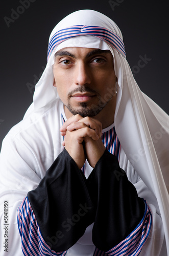 Photo: Arab businessman isolated on the white Arab businessman isolated on the white