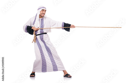 Photo: Arab man in tug of war concept Arab man in tug of war concept