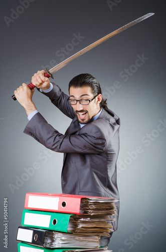 Photo: Man with sword and paper Man with sword and paper