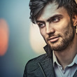 Multicolored digital painted image of elegant young man.