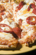 cheese pizza homemade with roasted red peppers hot chilis  garli
