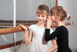 girl a word in one's boy's ear near barre