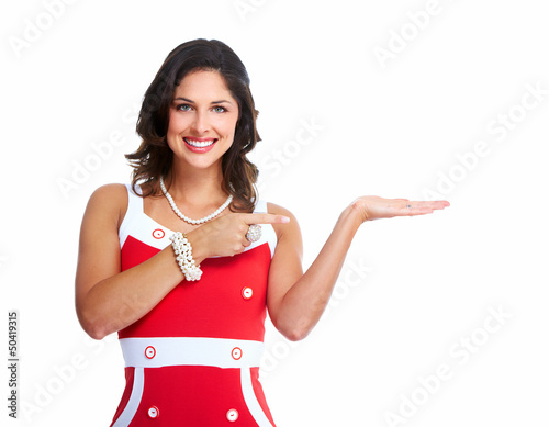 Photo: Young beautiful woman showing a copyspace. Young beautiful woman showing a copyspace.