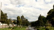 Quick flowing river and lush park in Cuenca, Ecuador