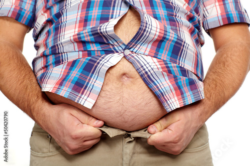Photo: Fat man with a big belly. Fat man with a big belly.
