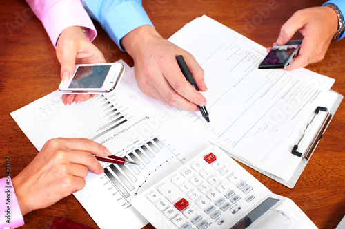 Photo: Business people group hands. Business people group hands.