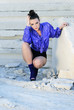 bright girl on heel amongst stone captive