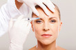 cosmetic surgeon giving face lifting injection